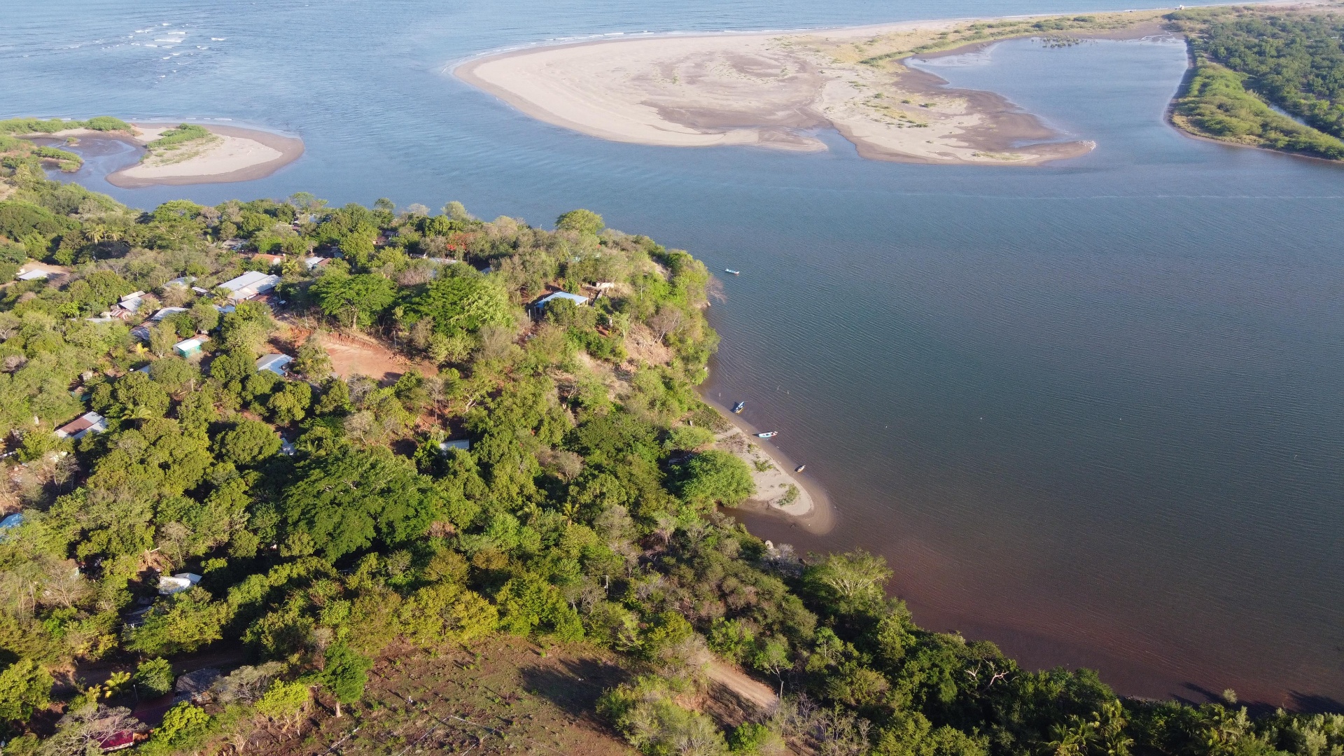 Aerial view of the Paradise Bay coastline and estuary in La Unión