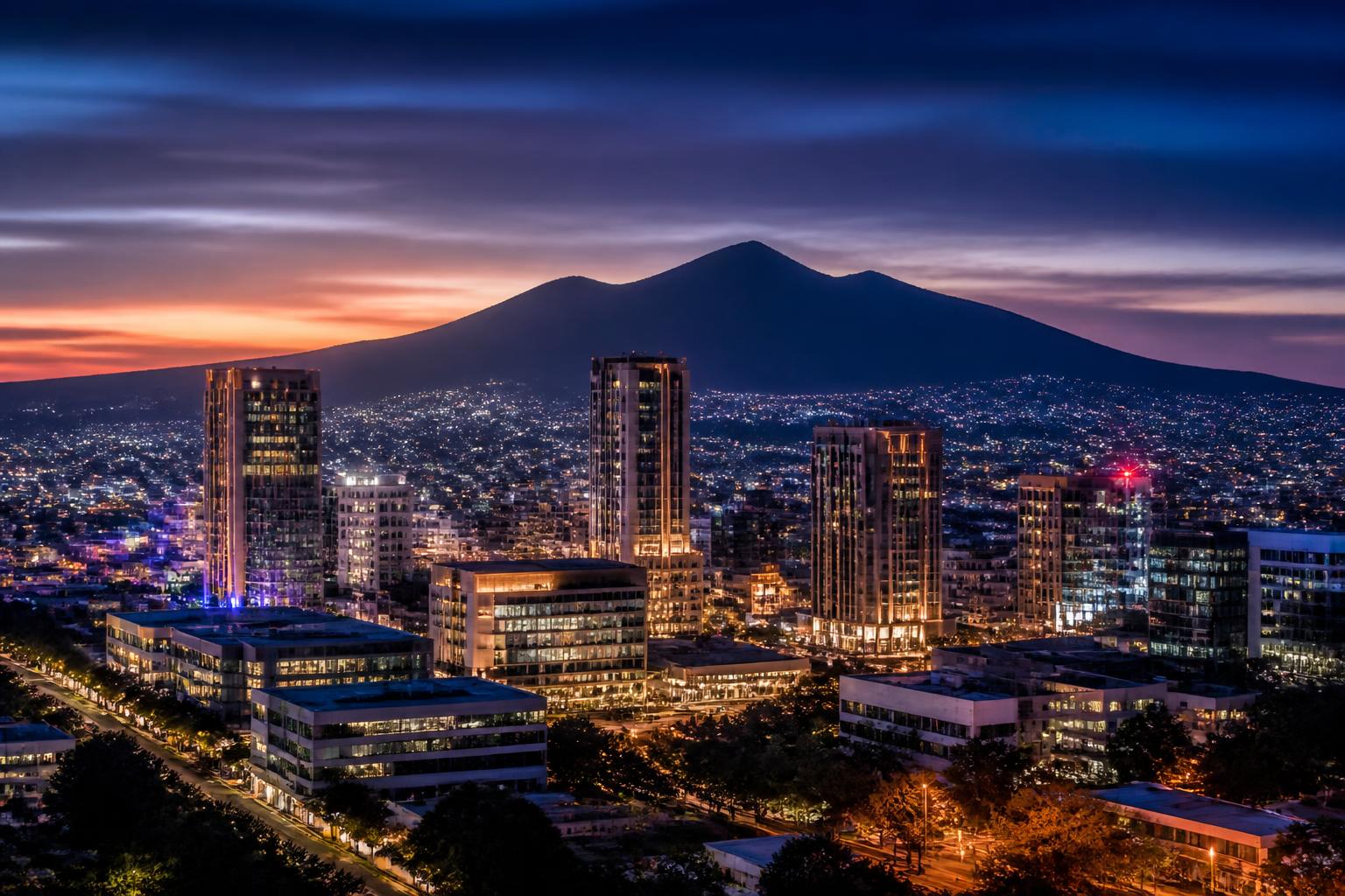 San Salvador skyline at blue hour with volcano in the distance